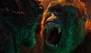 Kong shouting at Godzilla as he's pinned down in Godzilla vs. Kong.