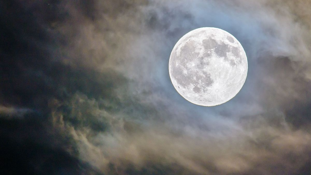 Full moon in a dark night sky