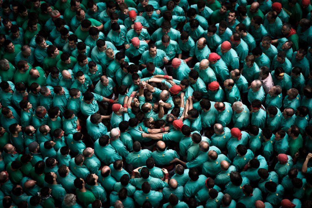 David Oliete climbs to great heights to capture the spirit of the human tower.