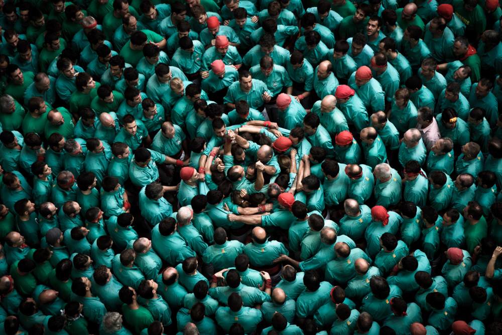 David Oliete climbs to great heights to capture the spirit of the human tower.