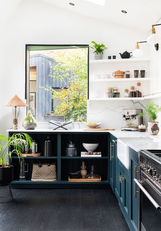 Dark blue kitchen with open shelving