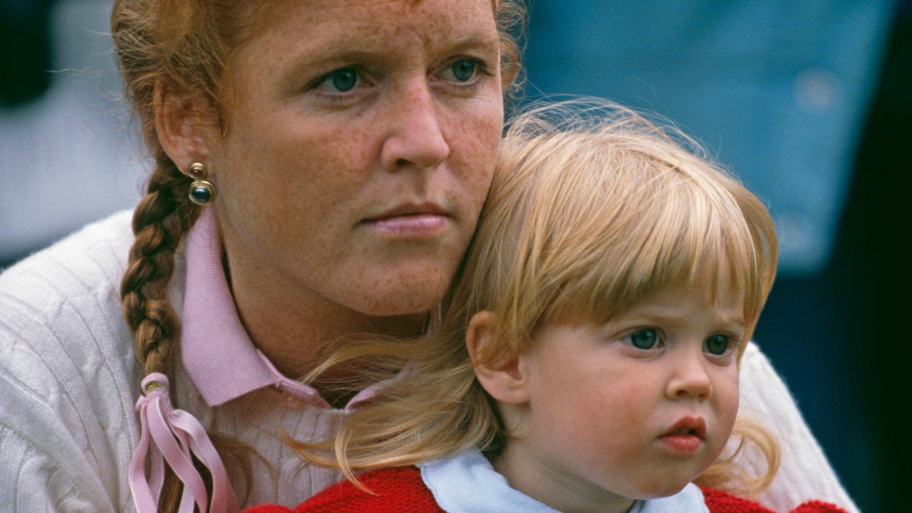 Sarah Ferguson, Duchess of York holding her daughter Princess Beatrice of York at the Royal Windsor Horse Show