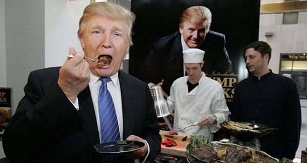 Donald Trump eating a steak.