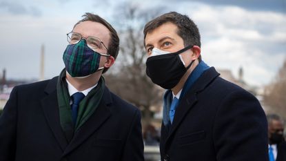 UNITED STATES - JANUARY 20: Pete Buttigieg, right, nominee to be Transportation secretary, and his husband Chasten, attend the inauguration before Joe Biden was sworn in as the 46th President of the United States on the West Front of the U.S. Capitol on Wednesday, January 20, 2021. 