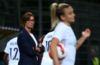 France's head coach Corinne Diacre looks on during a friendly football match between France and Vietnam at the Source Stadium in Orleans on July 1, 2022.