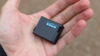 GoPro HERO13 Black action camera Enduro battery held in a hand