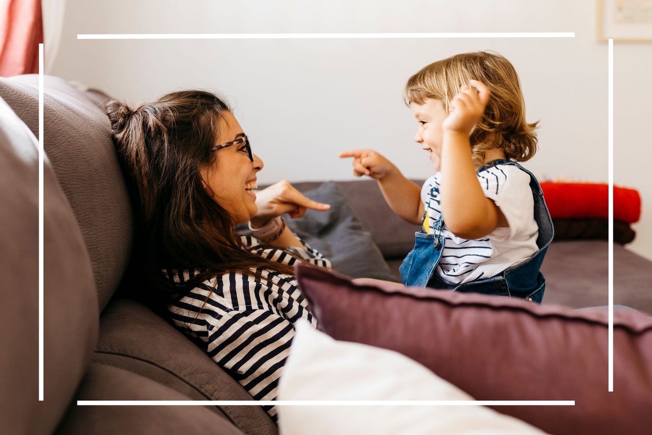 Mispronounced baby name Woman and child sat on sofa 