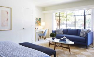 Blue color couch for seating in a room,Holiday House — Palm Springs, USA