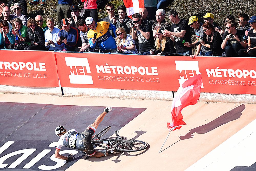 Fabian Cancellara hits the deck after falling on the velodrome