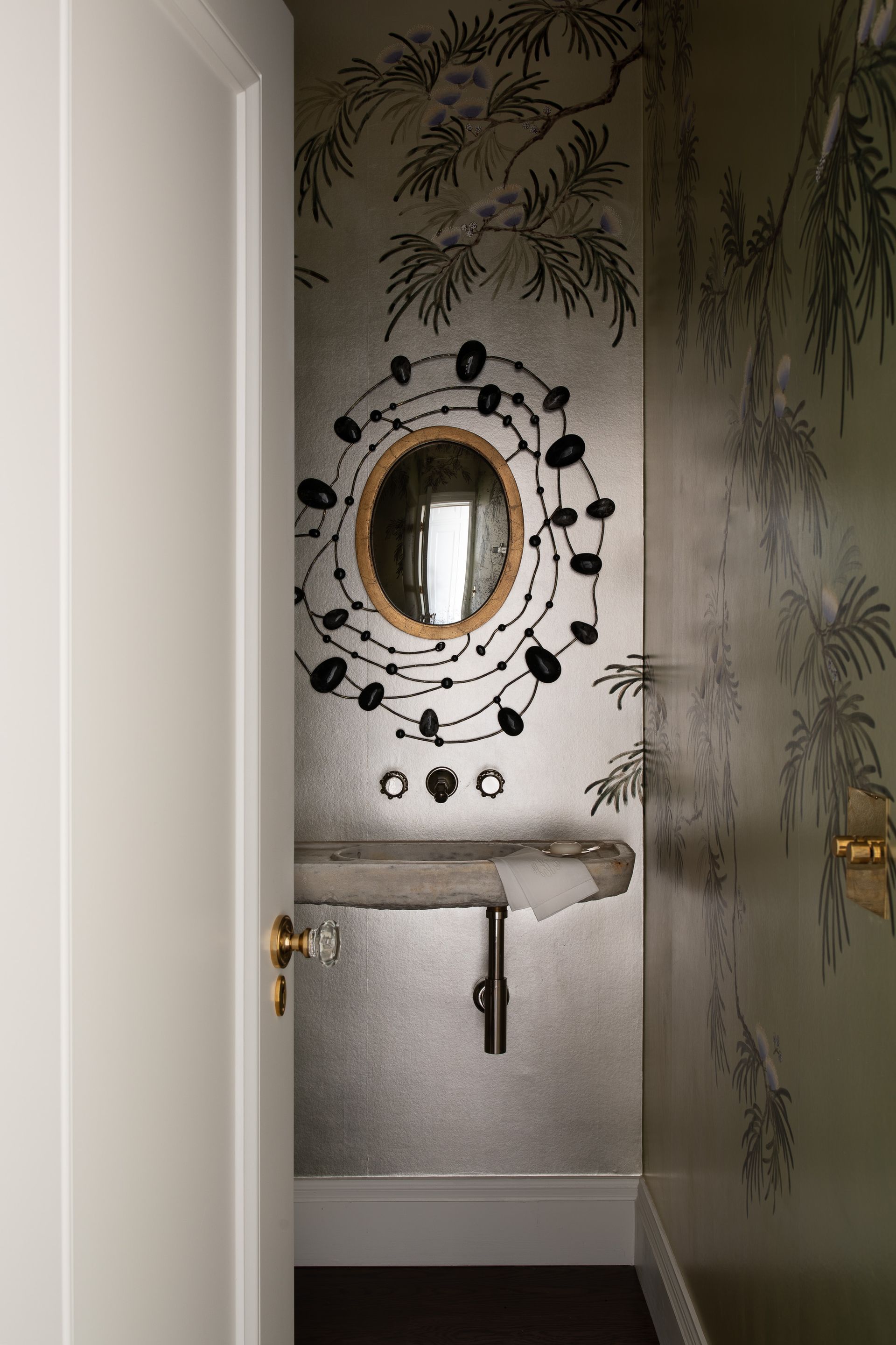 Half bath with bold mirror design