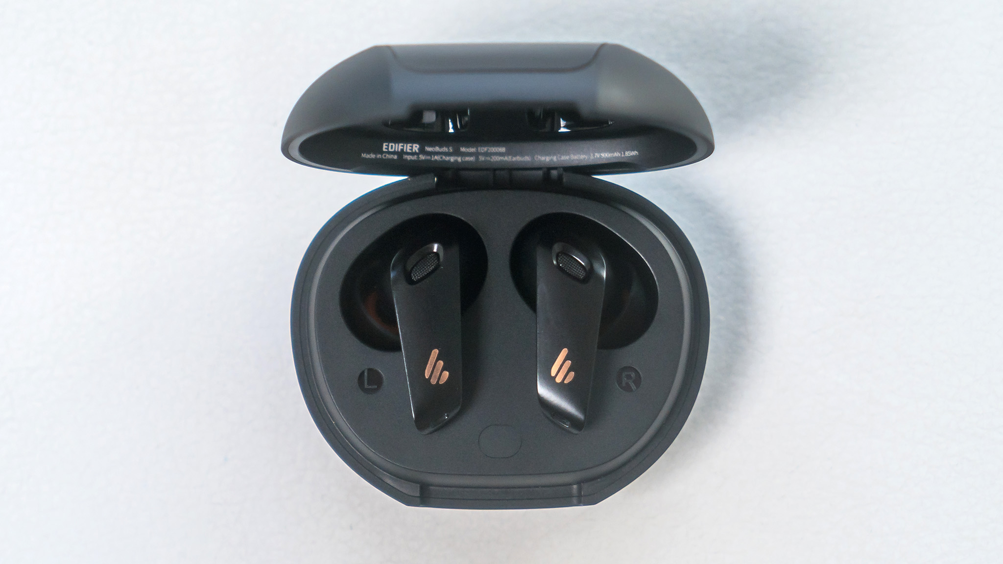 Edifier NeoBuds S earbuds in open case.