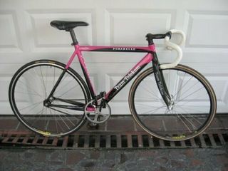 A 2003 Telekom Pinarello Pista track bike, which once belonged to Santiago Botero, and is signed by the now-retired Colombian rider