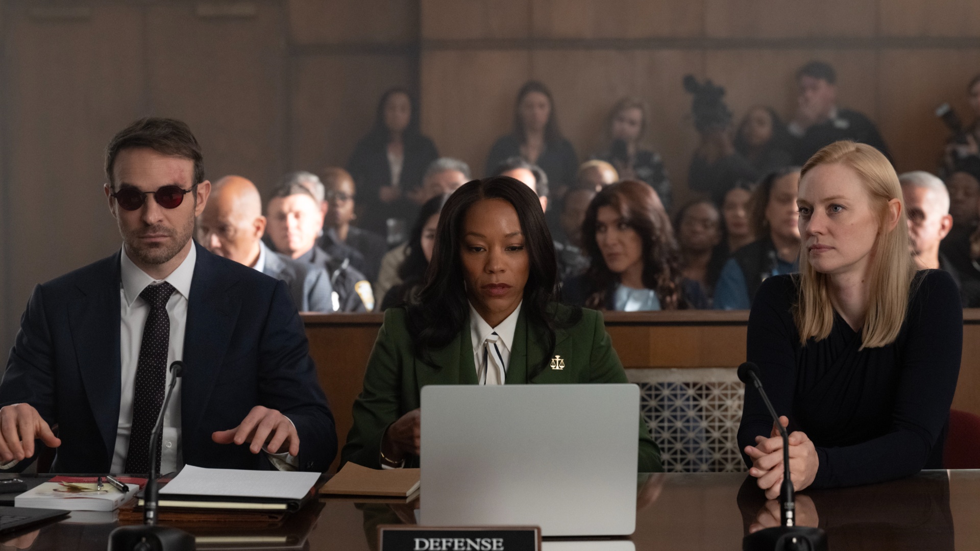 Charlie Cox, Nikki M. James, and Deborah Ann Woll as Matt Murdock, Kirsten McDuffie, and Karen Page in Daredevil: Born Again season 2