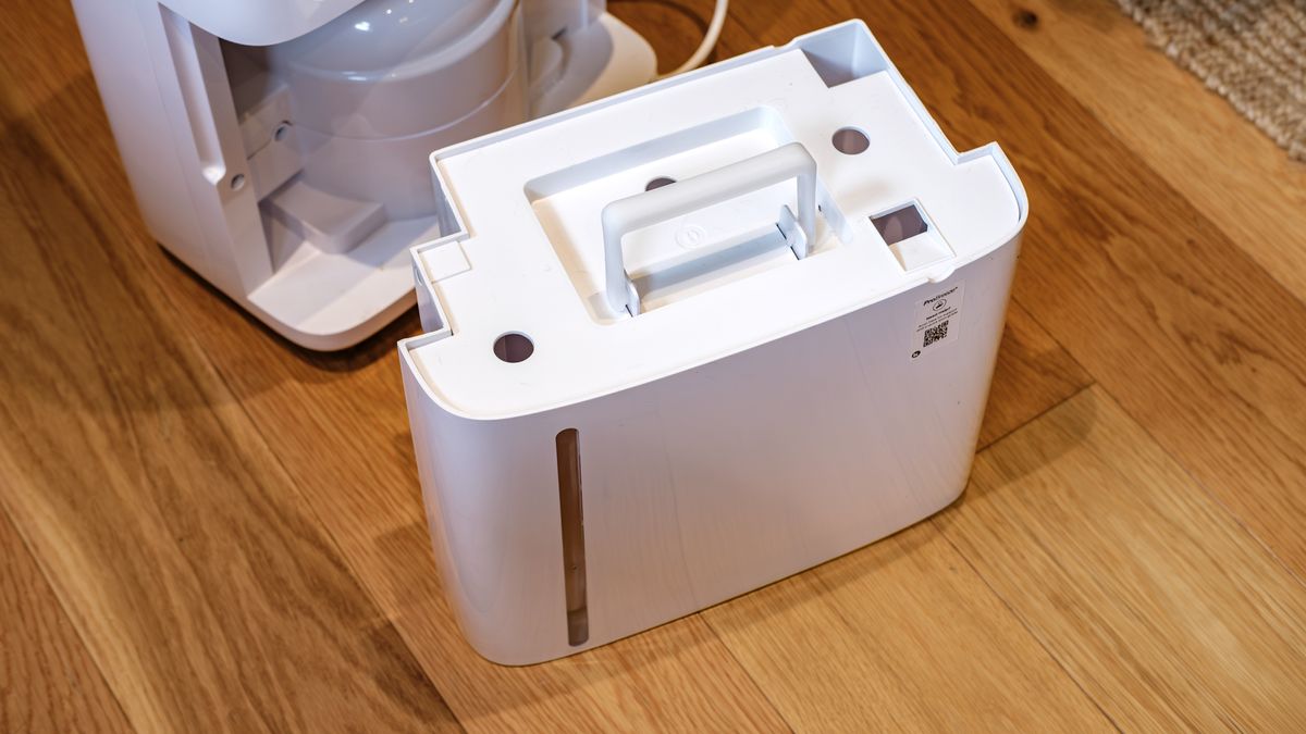 The Pro Breeze 50-pint Dehumidifier on a hard wood floor in a home environment