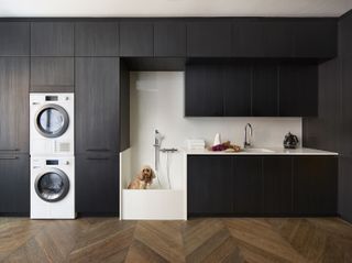 laundry room with pet shower by DesignSpace London