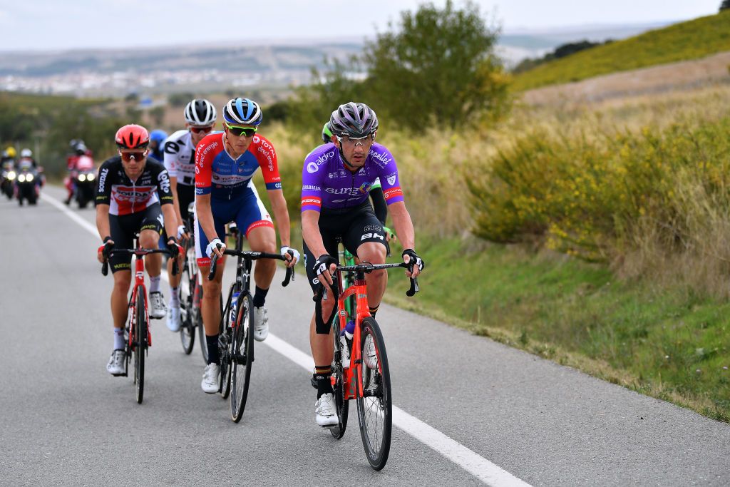 VINUESA SPAIN OCTOBER 22 Mark Donovan of The United Kingdom and Team Sunweb Tosh Van Der Sande of Belgium and Team Lotto Soudal Niki Terpstra of The Netherlands and Team Total Direct Energie Aritz Bagues Kalparsoro of Spain and Team Caja RuralSeguros RGA Willie Smit of South Africa and Team Burgos BH Breakaway during the 75th Tour of Spain 2020 Stage 3 a 1661km stage from Lodosa to La Laguna Negra Vinuesa 1735m lavuelta LaVuelta20 La Vuelta on October 22 2020 in Vinuesa Spain Photo by Justin SetterfieldGetty Images