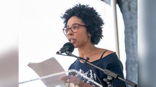 Marine biologist Ayana Elizabeth Johnson speaking on stage during the NYC Climate Strike rally and demonstration on Sept. 20, 2019.