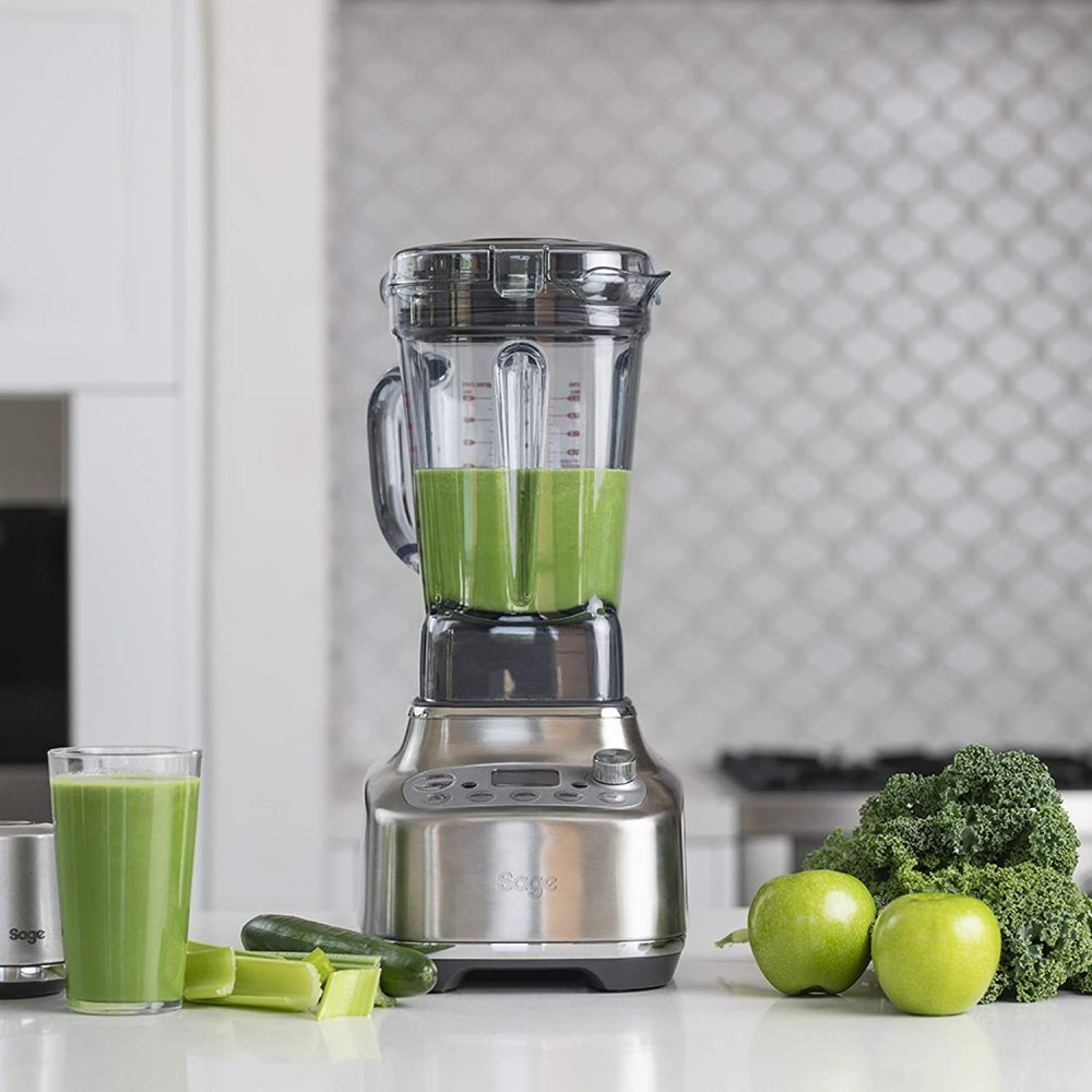 Sage Super Q blender on white counter next to green apples