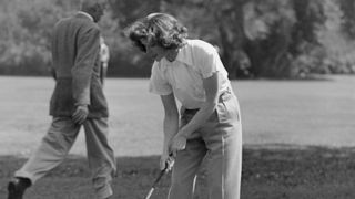 Katharine Hepburn playing golf