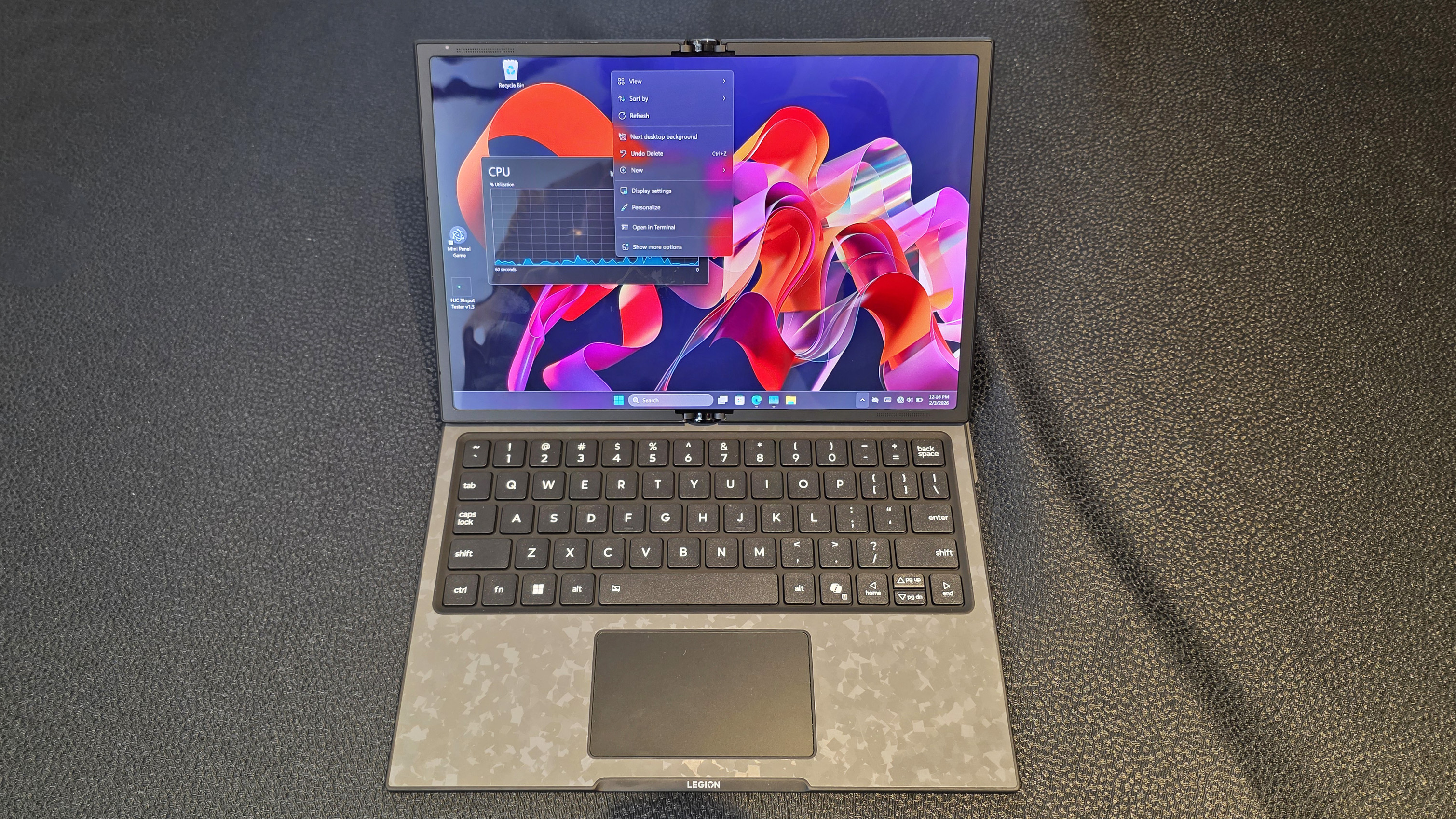Photos of the concept device from Lenovo called the Legion Go Fold.