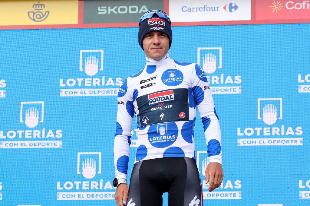 BEJES SPAIN SEPTEMBER 12 Remco Evenepoel of Belgium and Team Soudal Quick Step Polka Dot Mountain Jersey celebrates at podium during the 78th Tour of Spain 2023 Stage 16 a 1201km stage from Liencres to Bejes 528m UCIWT on September 12 2023 in Bejes Spain Photo by Alexander HassensteinGetty Images