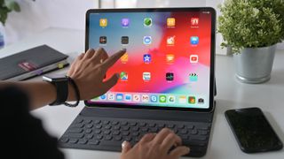 An iPad Pro with Magic Keyboard in use