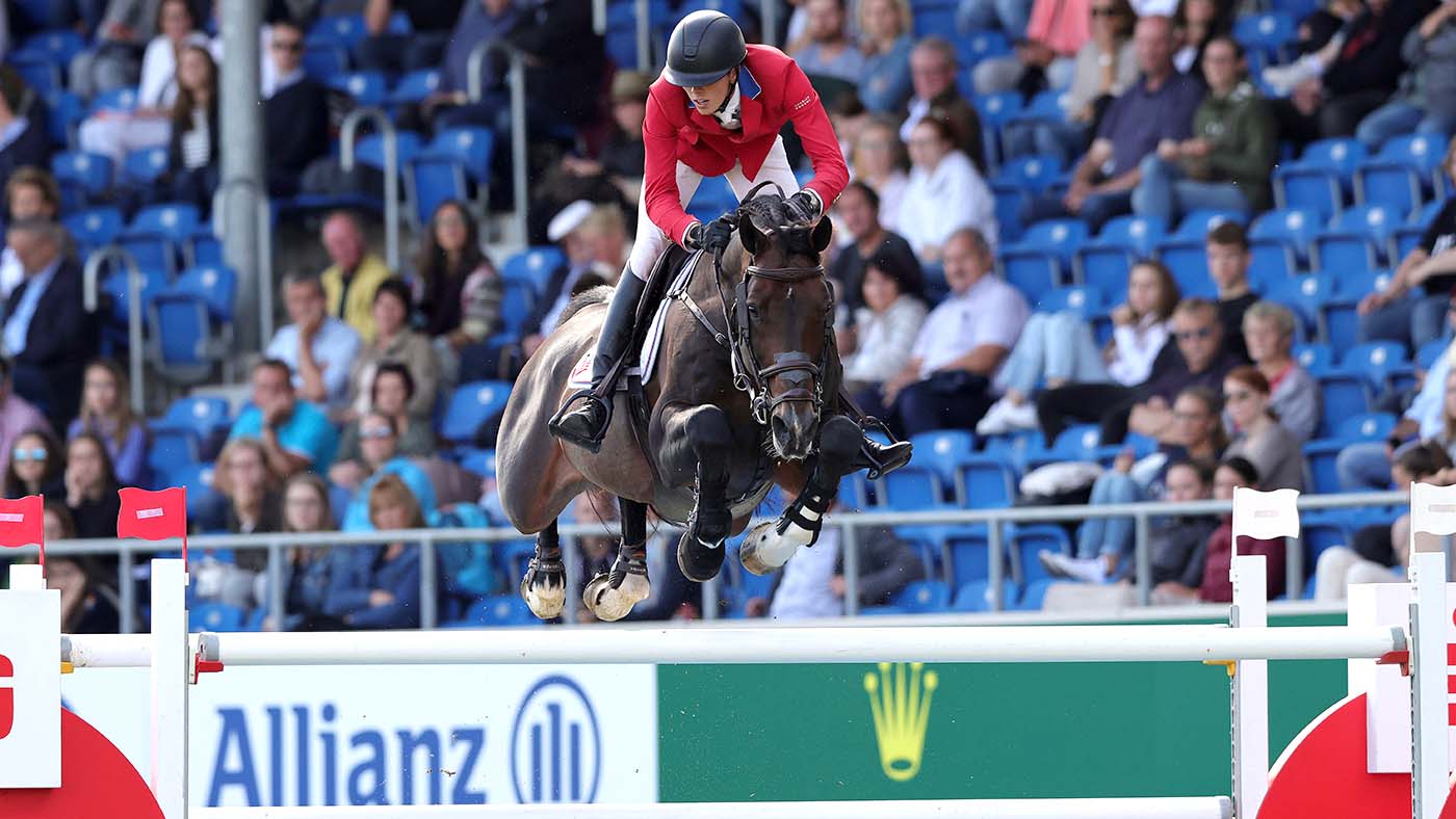 Balou Du Reventon competing with former rider Brian Moggre; he is now ridden by British showjumper Harry Charles