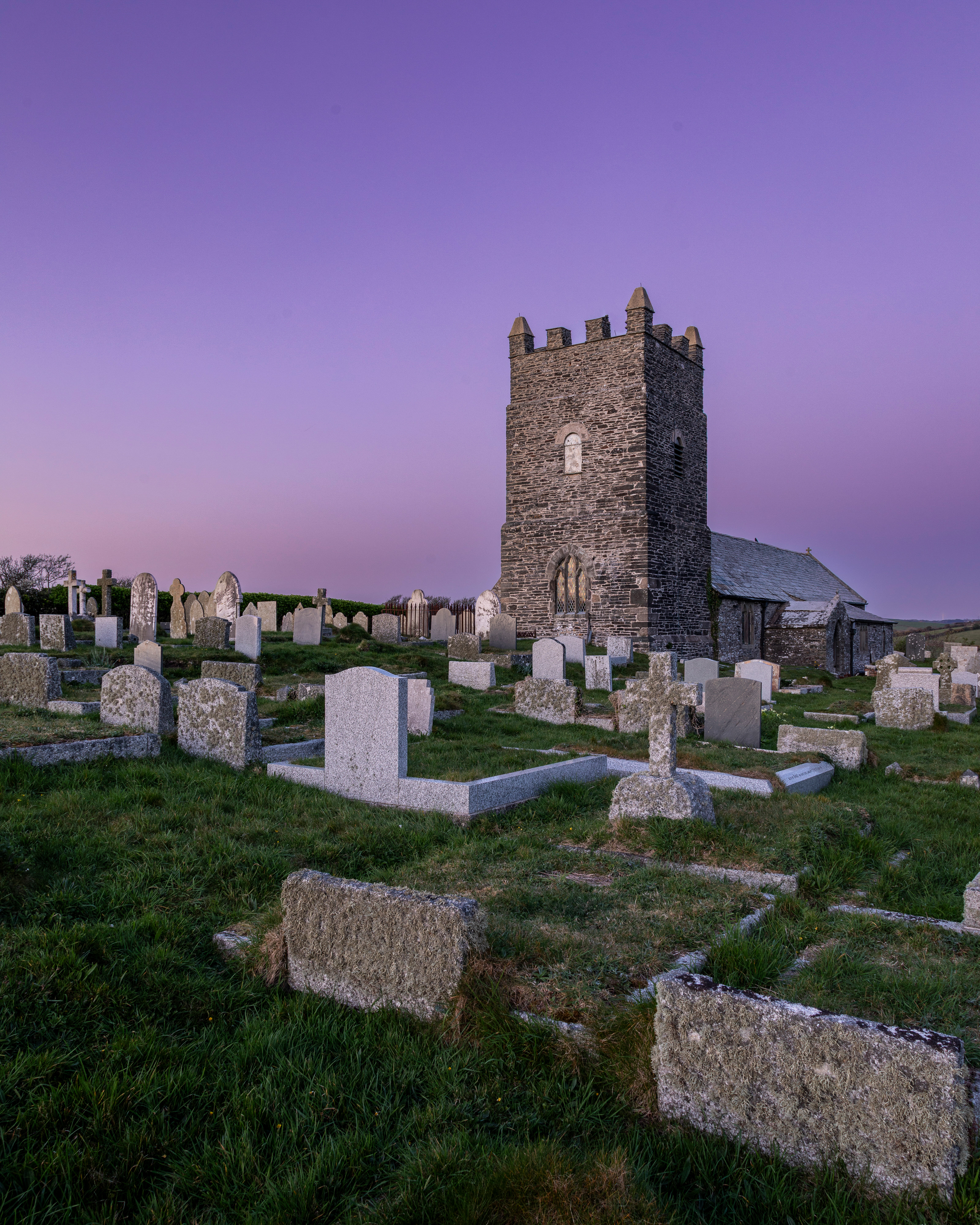 Church at sunset with purple sky