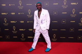 Former French football player Djibril Cisse poses prior to the 2023 Ballon d'Or France Football award ceremony at the Theatre du Chatelet in Paris on October 30, 2023.