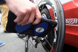 The UCI uses its magnetic resonance tablet to check for motors at the Tour de France