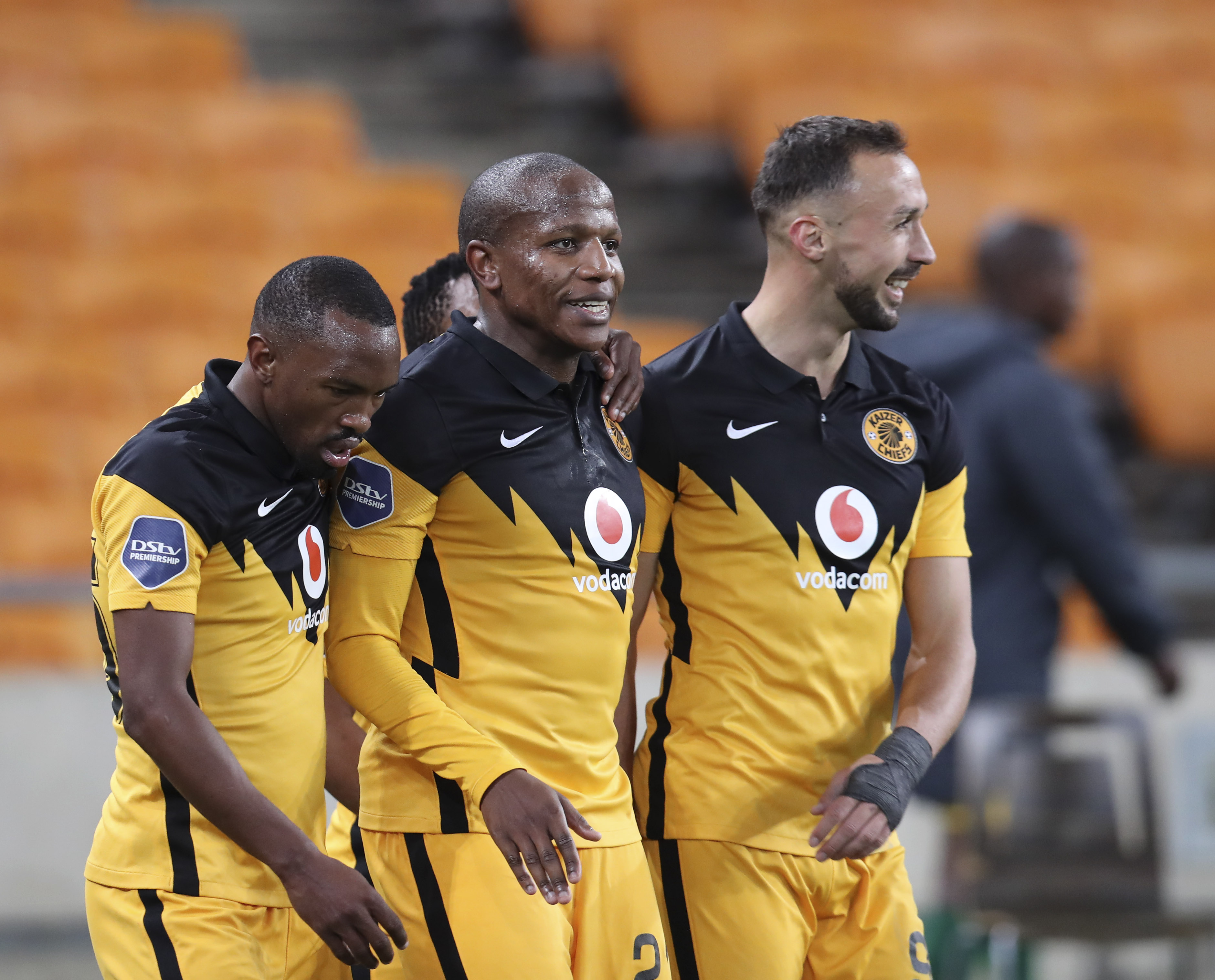 Lebogang Manyama of Kaizer Chiefs celebrates his hat-trick with teammates