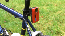 Image shows the Techalogic CR1 rear light and camera attached to a bike