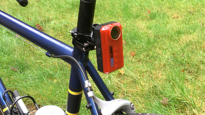 Image shows the Techalogic CR1 rear light and camera attached to a bike