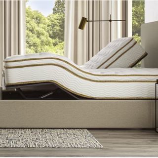A Saatva Adjustable Bed Base in a modern bedroom