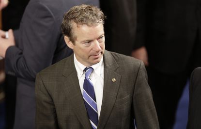 Rand Paul arrives for in the House chamber prior to Benjamin Netanyahu's speech.