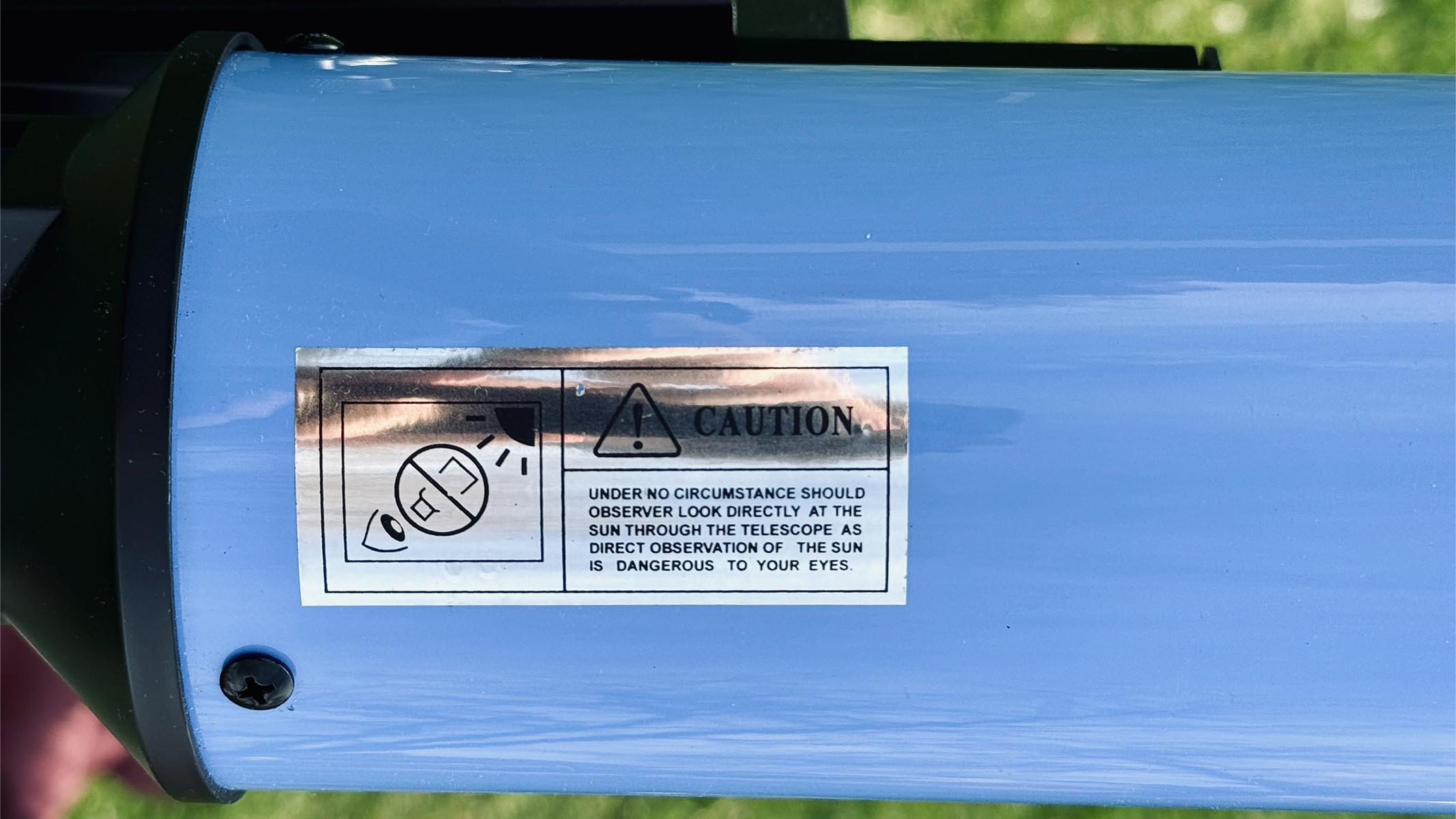 iOptron 80mm white light solar telescope caution label on the optical tube assembly
