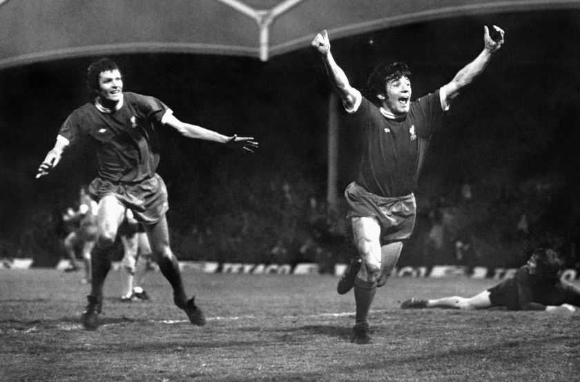 Kevin Keegan celebrates with teammate John Toshack after scoring a goal for Liverpool