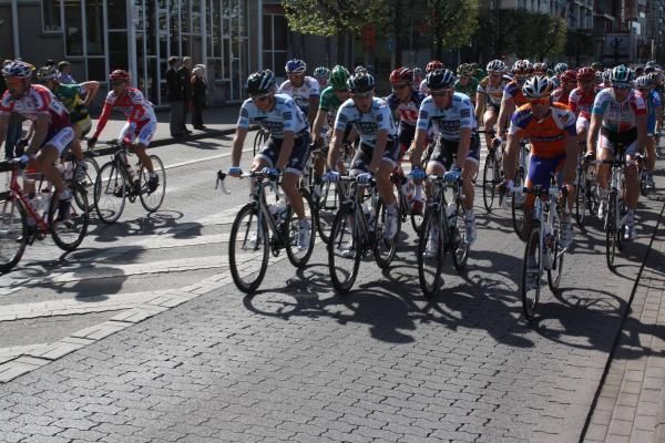 Saxo Bank-SunGard lead the peloton in the streets of Antwerp.