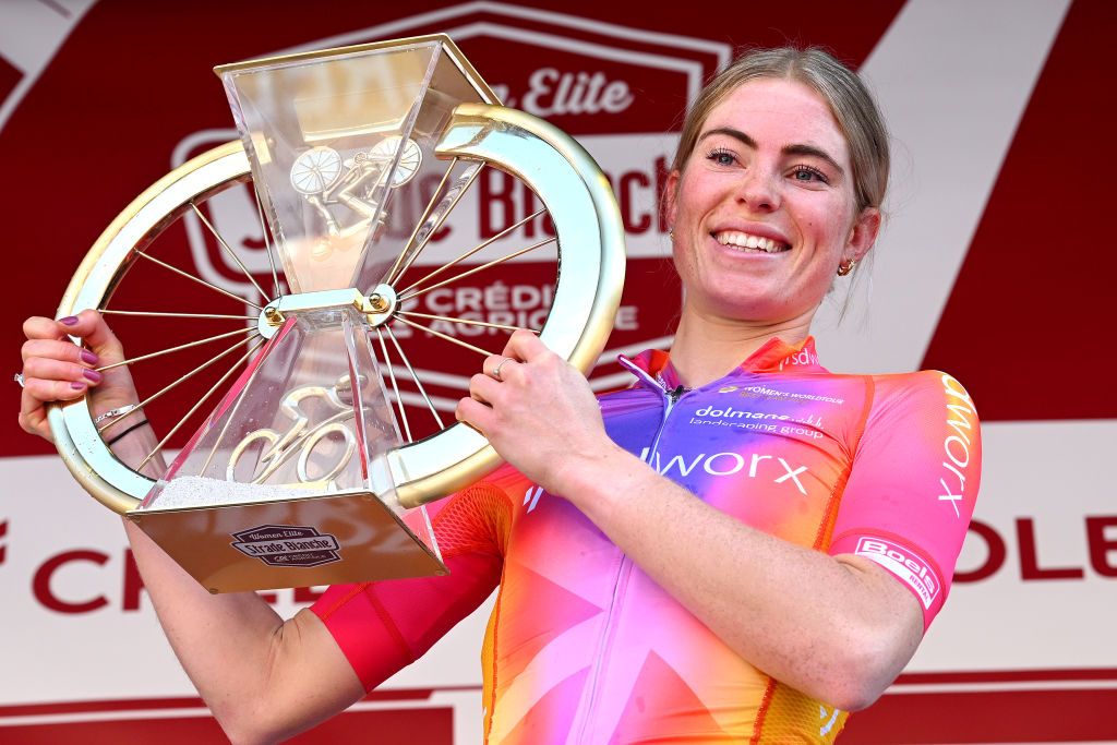 SIENA ITALY MARCH 04 Demi Vollering of The Netherlands and Team SD Worx celebrates at podium as race winner during the Eroica 9th Strade Bianche 2023 Womens a 136km one day race from Siena to Siena 318m StradeBianche on March 04 2023 in Siena Italy Photo by Luc ClaessenGetty Images