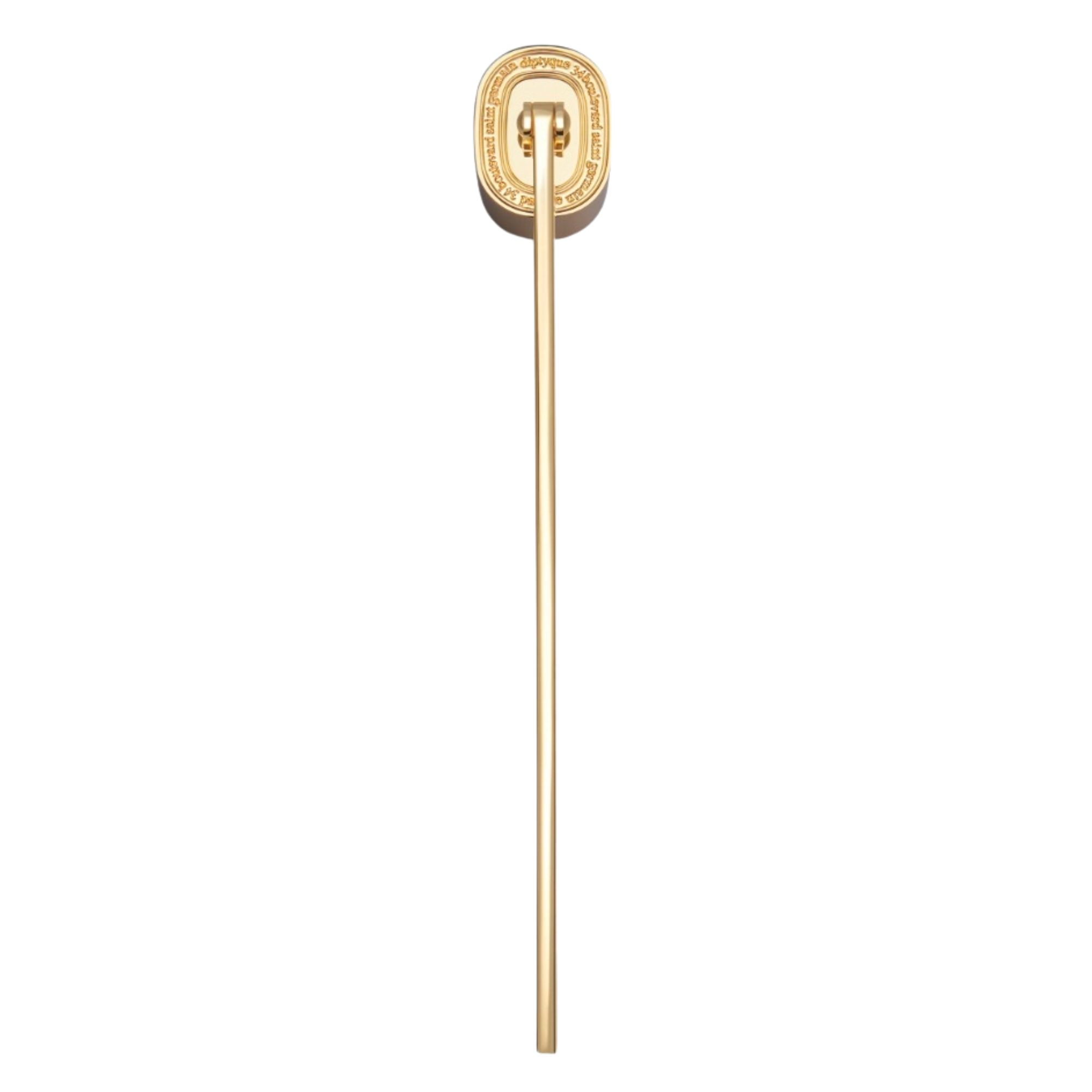 Gold Diptyque candle snuffer