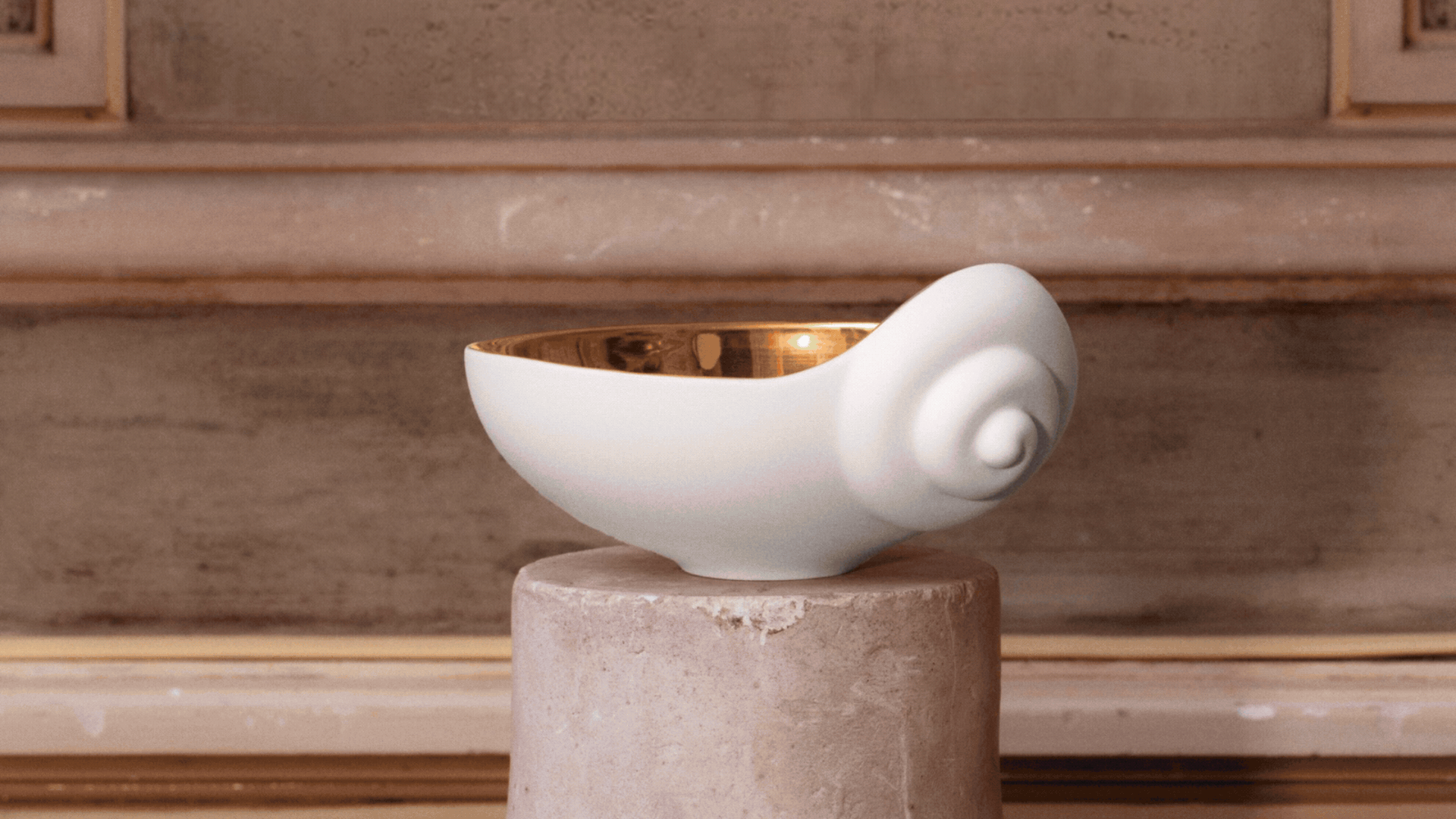 three different shell-inspired pieces of tableware