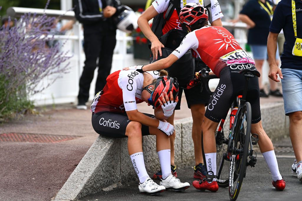 SAINTDIDESVOSGES FRANCE JULY 28 Sandra Levenez of France R comforts her teammate Victoire Berteau of France and Team Cofidis Fminin L after the 1st Tour de France Femmes 2022 Stage 5 a 1756km stage from BarleDuc to SaintDidesVosges TDFF UCIWWT on July 28 2022 in SaintDidesVosges France Photo by Tim de WaeleGetty Images