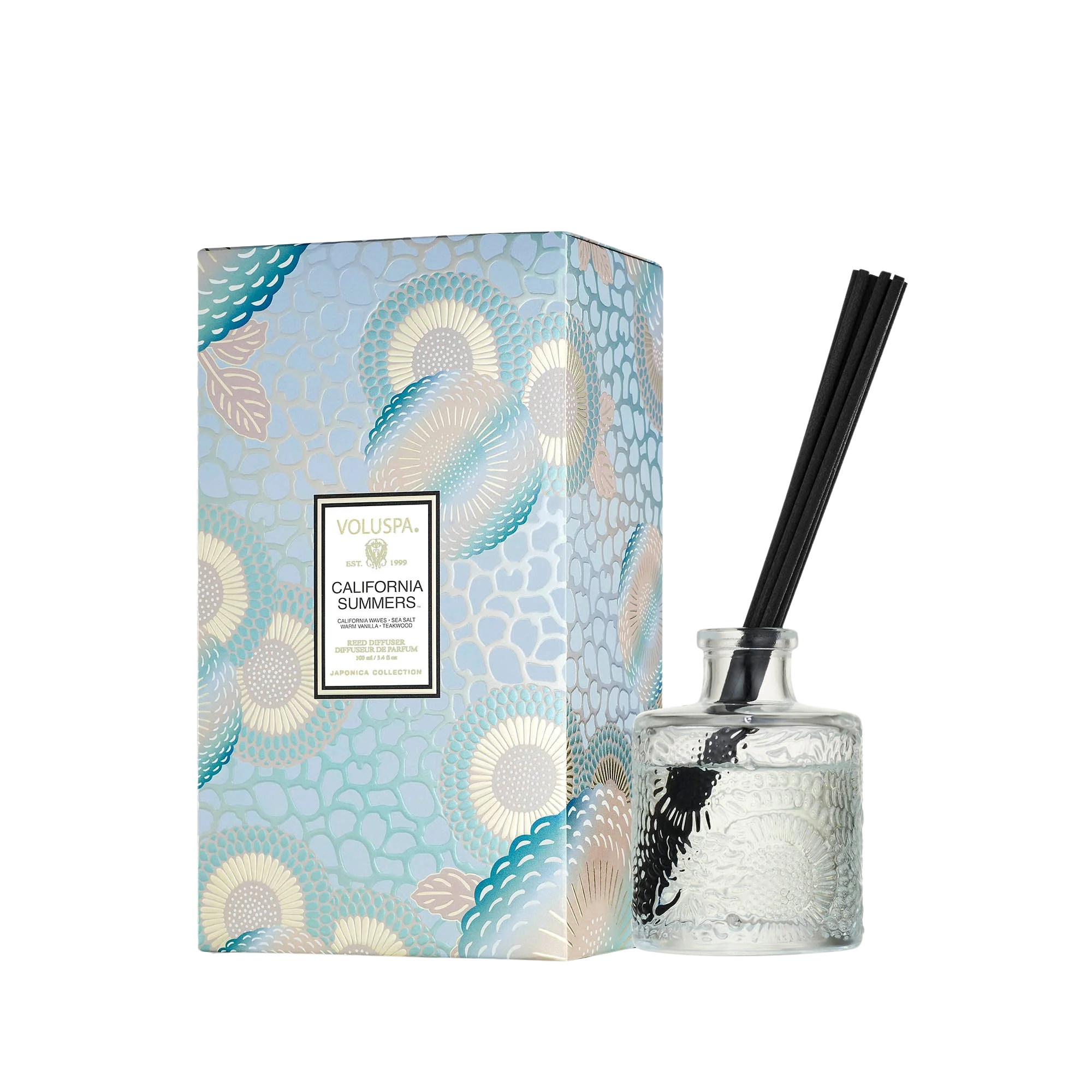 reed diffuser next to a box in light blue