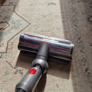 The Dyson V15 Detect Absolute cleaning on rug