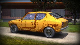 Best racing games - a tiny beat up car parked in a driveway