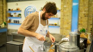 James Buckley cooking in Celebrity MasterChef 2023