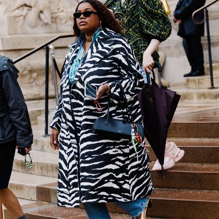 Gabriella wears zebra coat. 