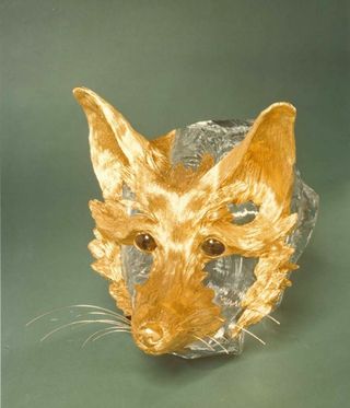 golden fox face from chaumet exhibition in paris