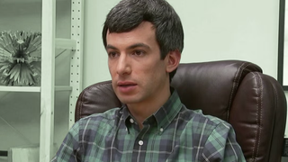 Comedian Nathan Fielder, wearing green check shirt, in Nathan For You