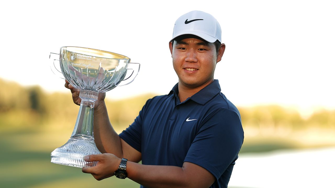 Tom Kim poses with the Shriners Children&#039;s Open trophy